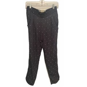 Anthropologie blue pants with gold diamonds